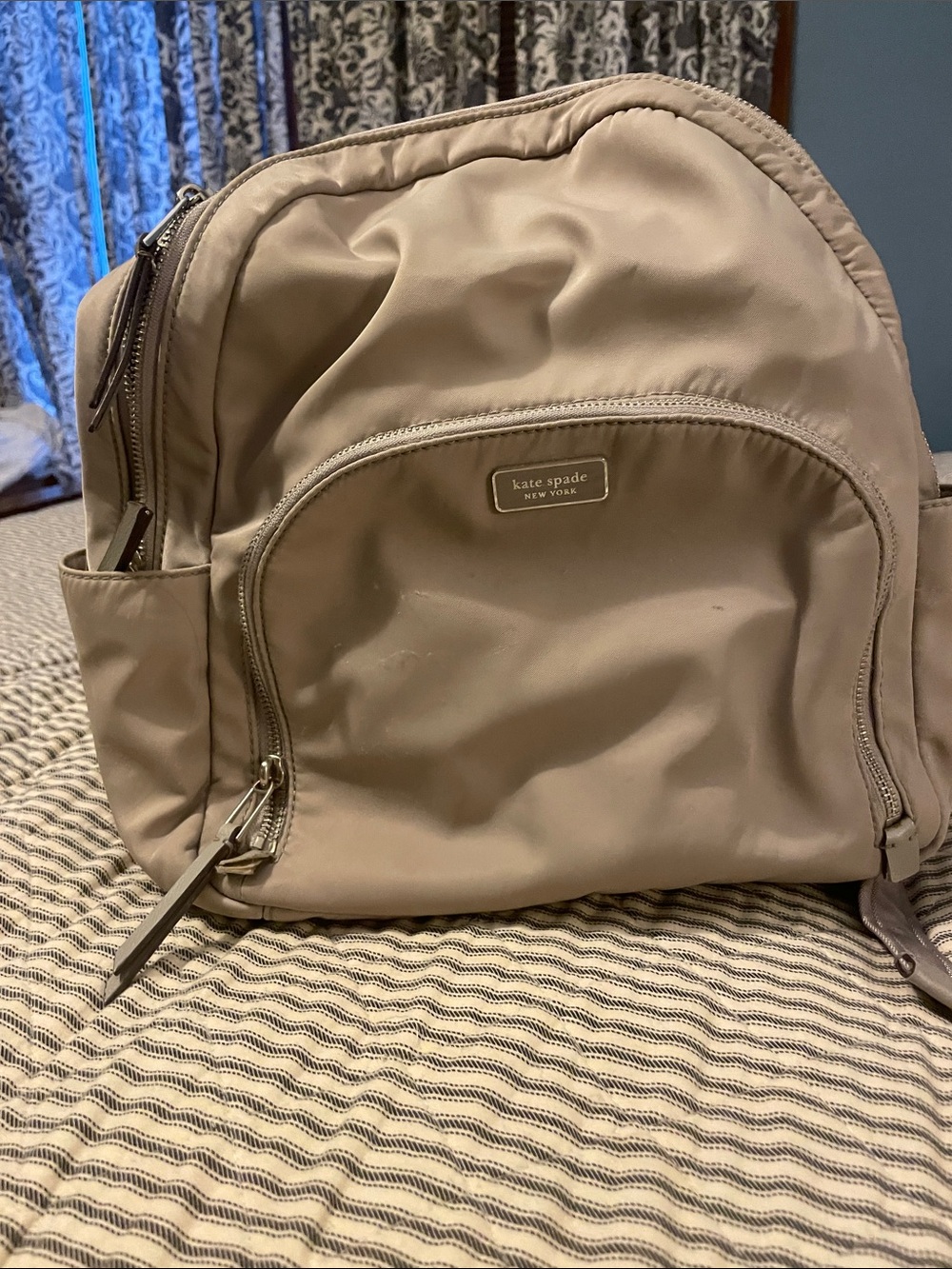 kate spade beige nylon backpack with front zip pocket